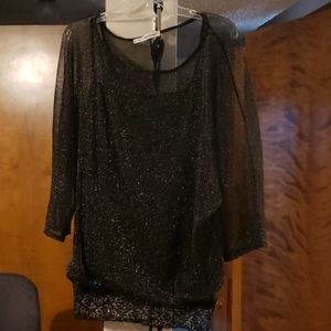 Black blouse sparkles, sheer with tank